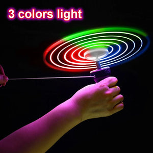 Planet Gates 1pc Random Color 1pc Pull Wire Glow UFO Funny Spinning Flyer Luminous LED Light Handle Top Toys for Kids Gifts Outdoor Sport Parent-child Game