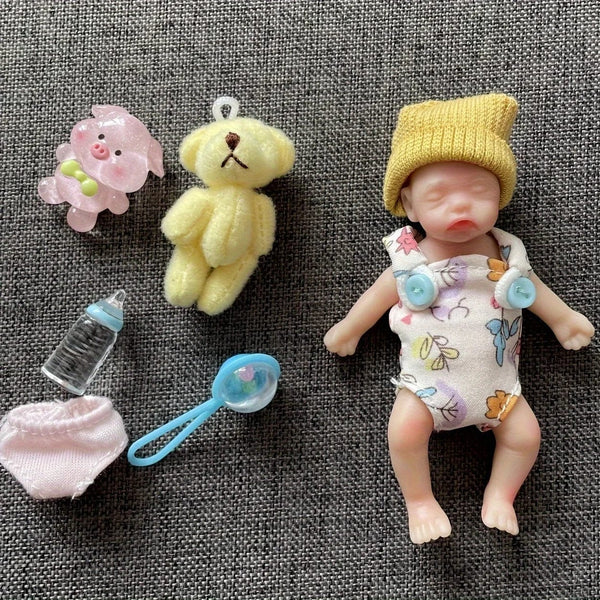 Planet Gates 8cm Cute Mini Silicone Bebe Reborn Girl With 2 Sets Mini Outfits for Each Reborn Baby Girl Soft Touching Feeling Flexible Doll