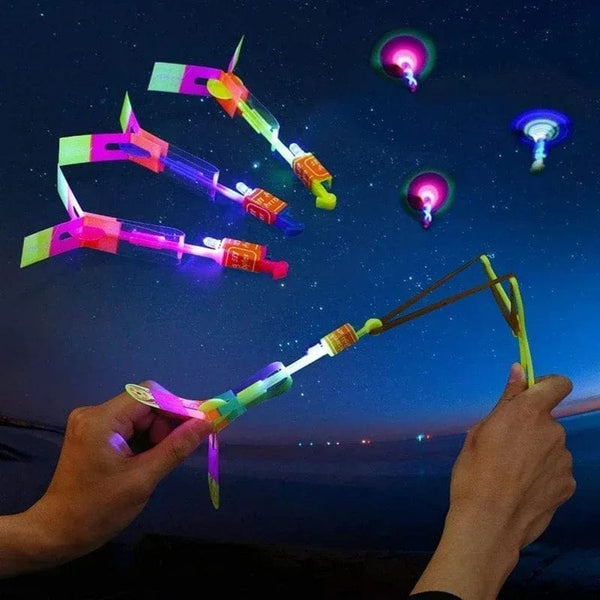 Planet Gates B / 50PCS 1/10/30/50pcs Amazing Light Toy Arrow Rocket Helicopter Flying Toy LED Light Toys Party Fun Gifts Rubber Band Catapult