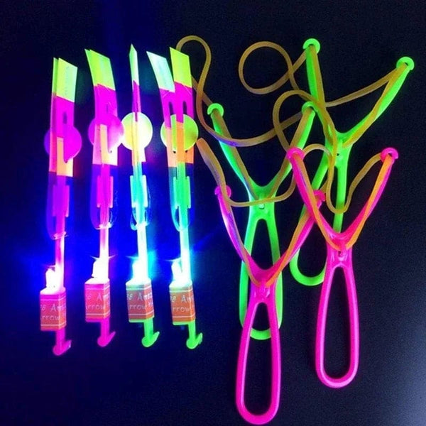 Planet Gates B / 50PCS 1/10/30/50pcs Amazing Light Toy Arrow Rocket Helicopter Flying Toy LED Light Toys Party Fun Gifts Rubber Band Catapult