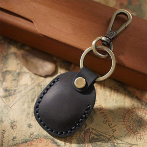 Planet Gates Black Secure Your Airtags With This Stylish Retro Faux Leather Case + Keychain