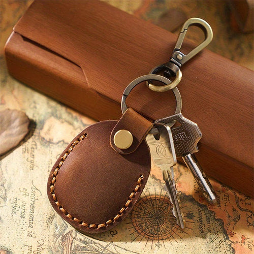 Planet Gates Brown Secure Your Airtags With This Stylish Retro Faux Leather Case + Keychain