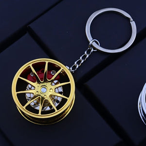 Planet Gates Golden Brake 360 rotating car keychain pendant, creative car keychain decoration, a unique gift for car lovers