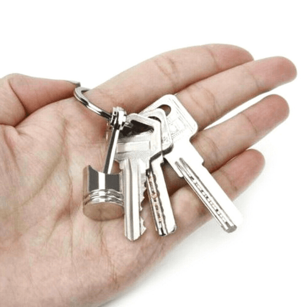 Planet Gates Metallic Luster Creative Metal Piston Model Keyring: A Stylish Keychain for Car Enthusiasts!