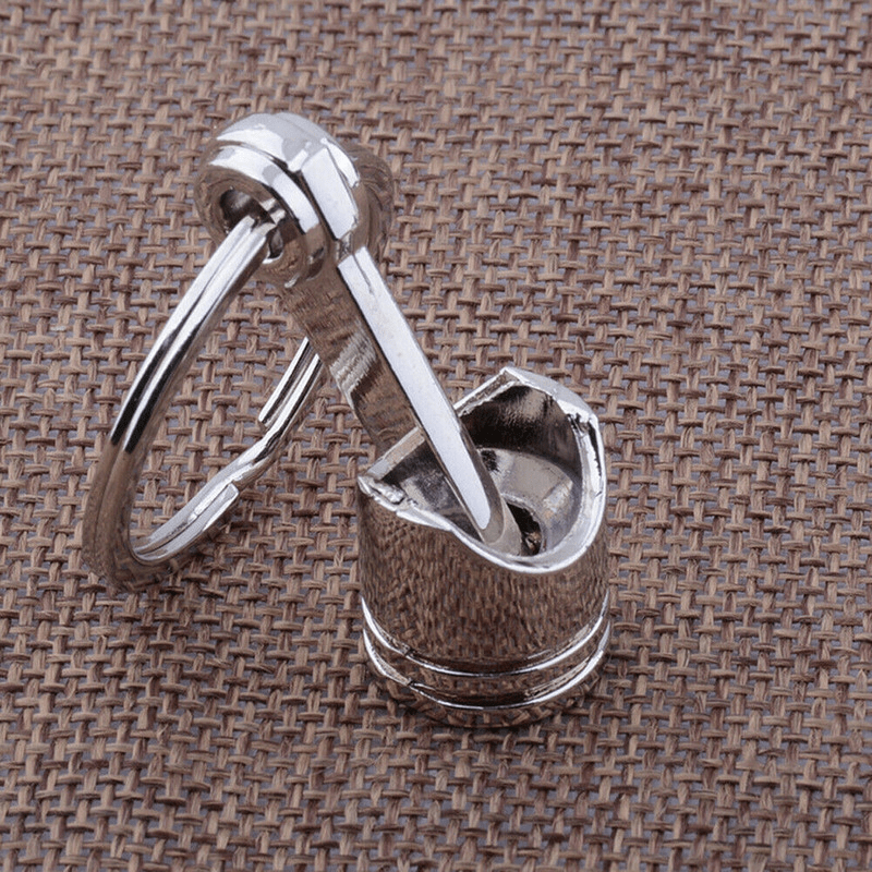 Planet Gates Metallic Luster Creative Metal Piston Model Keyring: A Stylish Keychain for Car Enthusiasts!