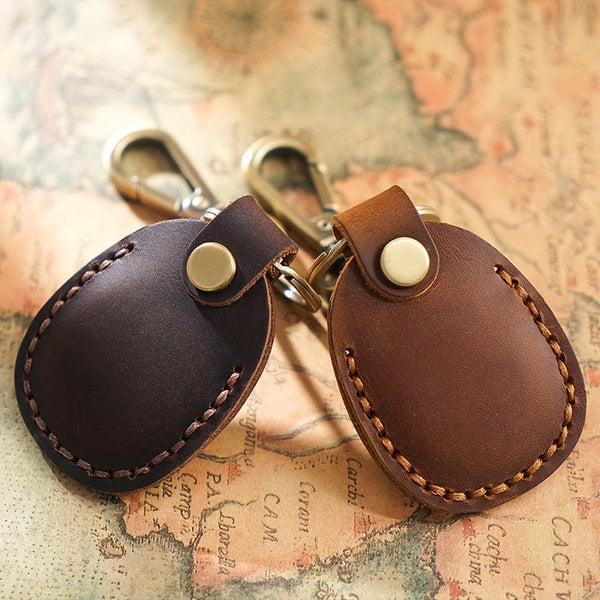 Planet Gates Secure Your Airtags With This Stylish Retro Faux Leather Case + Keychain