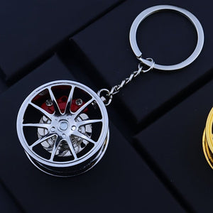 Planet Gates Silvery Brake 360 rotating car keychain pendant, creative car keychain decoration, a unique gift for car lovers