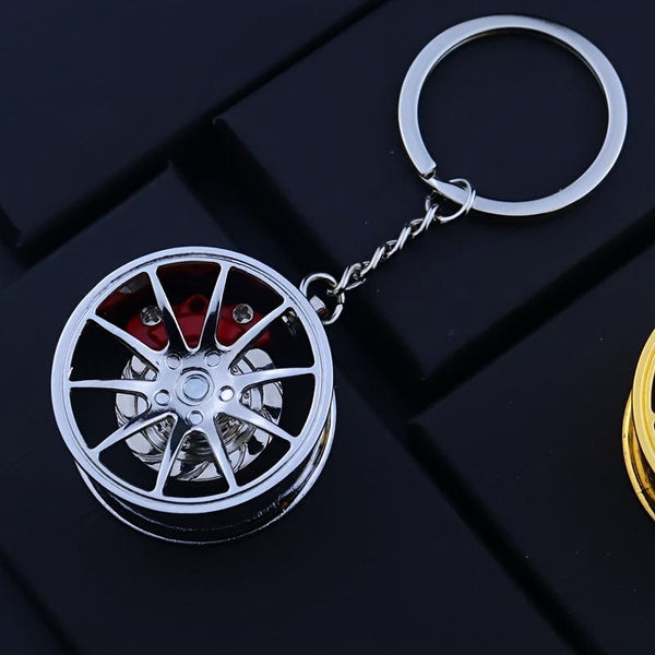 Planet Gates Silvery Brake 360 rotating car keychain pendant, creative car keychain decoration, a unique gift for car lovers