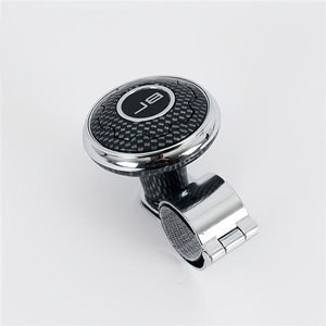 Planet Gates Upgrade Your Driving Experience With A Carbon Fiber Steering Wheel Knob!